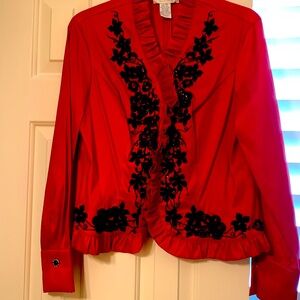 A red evening jacket by Jackie Jon